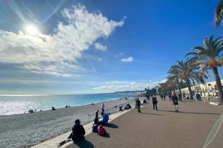 The Promenade d'Anglais in Nice, France during a visit to Nice in the winter with the sun shining and palm trees