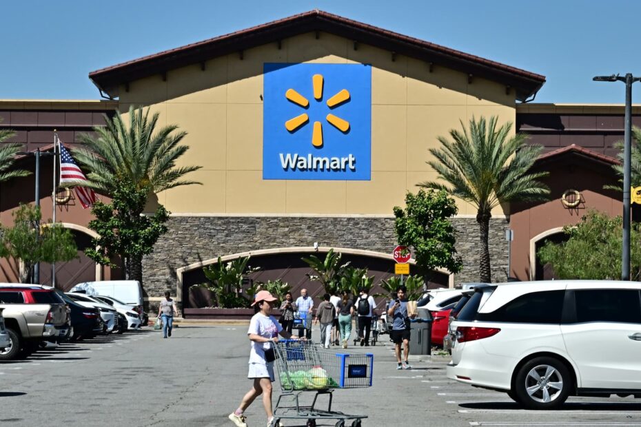 Walmart CFO says price hikes from tariffs could start later this month, as retailer beats on earnings